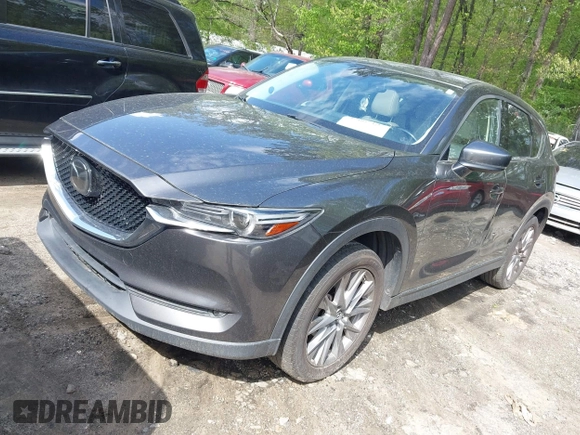 2019 Mazda CX-5 Grand Touring with VIN JM3KFBDM7K0619379, listed as a IAAI auction lot 42007107 with 209,590 mi miles. Bid and sale history available at carsss.com. Image 2.