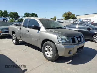 2006 Nissan Titan SE with VIN 1N6AA06A66N527552, listed as a Copart auction lot 52979735 with 218,731 mi miles and Salvage title. Bid and sale history available at DreamBid. Image 4.
