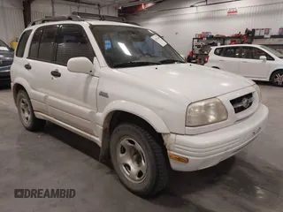 2000 Suzuki Grand Vitara JLX z VIN JS3TD62VXY4130242, wystawiony jako IAAI lot #41701849 z przebiegiem 106 700 mil mil oraz . Historia ofert i sprzedaży dostępna na DreamBid. Obrazek 1.