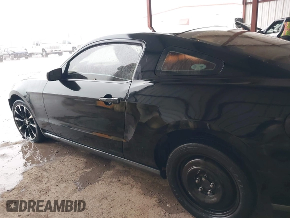 2012 Ford Mustang V6 Premium with VIN 1ZVBP8AM5C5223787, listed as a IAAI auction lot 42141944 with 73,960 mi miles. Bid and sale history available at carsss.com. Image 14.