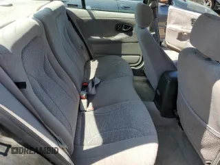 2000 Saturn SL with VIN 1G8ZK5271YZ184701, listed as a Copart auction lot 61598135 with 123,309 mi miles and Salvage title. Bid and sale history available at DreamBid. Image 10.