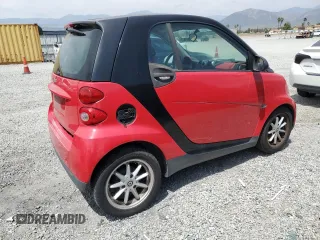 2009 Smart fortwo Pure z VIN WMEEJ31X89K291074, wystawiony jako Copart lot #56897635 z przebiegiem 145 504 mil mil oraz Tytuł czysty. Historia ofert i sprzedaży dostępna na DreamBid. Obrazek 3.