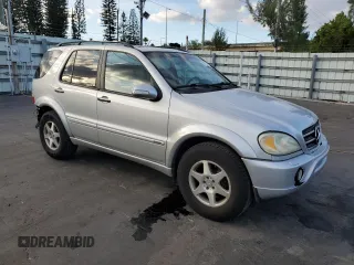 2002 Mercedes-Benz M-Class with VIN 4JGAB75EX2A326747, listed as a Copart auction lot 82106664 with 264,245 mi miles and Salvage Title. Bid and sale history available at carsss.com. Image 4.