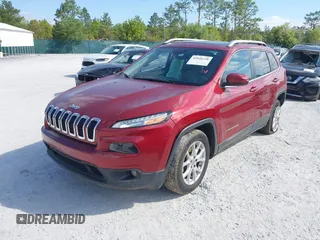 2017 Jeep Cherokee Latitude with VIN 1C4PJLCS6HW604607, listed as a IAAI auction lot 42026228 with 164,934 mi miles and . Bid and sale history available at carsss.com. Image 2.