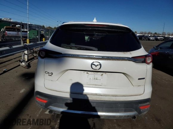 2020 Mazda CX-9 Grand Touring with VIN JM3TCBDY8L0402974, listed as a Copart auction lot 82790654 with 105,220 mi miles and Salvage Title. Bid and sale history available at carsss.com. Image 6.