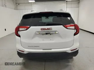 2023 GMC Terrain SLT z VIN 3GKALPEG2PL188824, wystawiony jako Copart lot #64419865 z przebiegiem 69 644 mil mil oraz Czysty tytuł • Clean title. Historia ofert i sprzedaży dostępna na DreamBid. Obrazek 6.