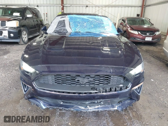 2021 Ford Mustang EcoBoost z VIN 1FA6P8TH4M5126706, wystawiony jako IAAI lot #42465164 z przebiegiem 49 795 mil mil oraz . Historia ofert i sprzedaży dostępna na DreamBid. Obrazek 12.