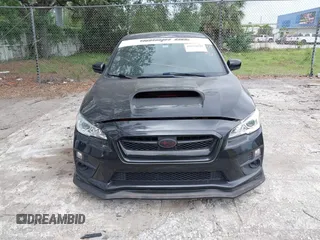 2016 Subaru WRX with VIN JF1VA1B65G9801044, listed as a IAAI auction lot 41973939 with 82,420 mi miles. Bid and sale history available at carsss.com. Image 12.