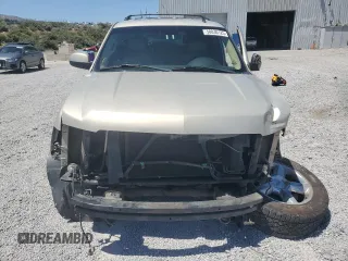 2007 Chevrolet Tahoe LTZ z VIN 1GNFK13057R201668, wystawiony jako Copart lot #58030125 z przebiegiem 197 818 mil mil oraz Szkoda całkowita • Salvage title. Historia ofert i sprzedaży dostępna na DreamBid. Obrazek 5.