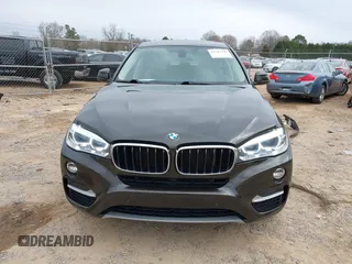 2015 BMW X6 xDrive35i z VIN 5UXKU2C56F0N76862, wystawiony jako IAAI lot #41747776 z przebiegiem 119 426 mil mil oraz . Historia ofert i sprzedaży dostępna na DreamBid. Obrazek 13.