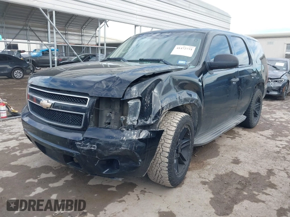 2011 Chevrolet Tahoe Commercial with VIN 1GNLC2E00BR325388, listed as a IAAI auction lot 41472731 with 265,781 mi miles and . Bid and sale history available at DreamBid. Image 2.