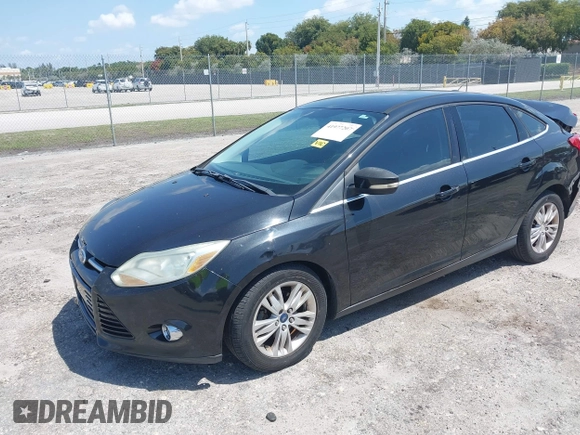 2012 Ford Focus SEL with VIN 1FAHP3H22CL146186, listed as a IAAI auction lot 41977207 with 127,396 mi miles. Bid and sale history available at carsss.com. Image 17.