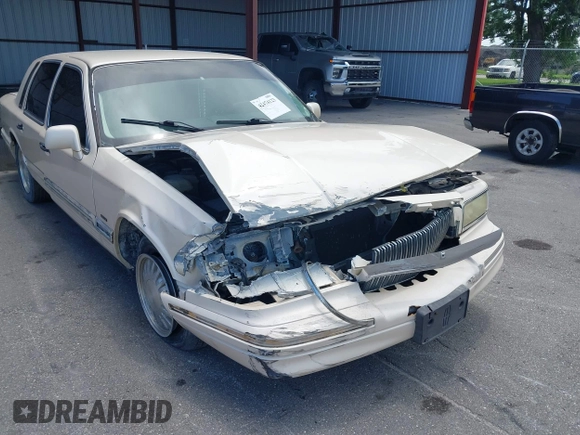 1996 Lincoln Town Car Cartier with VIN 1LNLM83W7TY634343, listed as a IAAI auction lot 42474123 with 193,705 mi miles and . Bid and sale history available at DreamBid. Image 6.