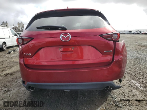 2021 Mazda CX-5 Grand Touring with VIN JM3KFADM1M1395789, listed as a Copart auction lot 45479385 with 38,179 mi miles and Salvage Title. Bid and sale history available at carsss.com. Image 6.