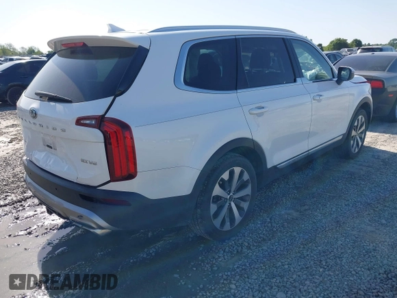 2020 Kia Telluride EX z VIN 5XYP34HCXLG071376, wystawiony jako IAAI lot #41992345 z przebiegiem 95 505 mil mil oraz . Historia ofert i sprzedaży dostępna na DreamBid. Obrazek 4.