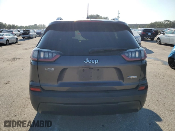 2021 Jeep Cherokee Latitude Plus z VIN 1C4PJLLB6MD187284, wystawiony jako Copart lot #66319094 z przebiegiem 77 876 mil mil oraz Szkoda całkowita • Salvage title. Historia ofert i sprzedaży dostępna na DreamBid. Obrazek 6.