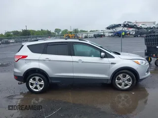 2013 Ford Escape SE with VIN 1FMCU9G94DUC52497, listed as a IAAI auction lot 42352704 with 194,648 mi miles and . Bid and sale history available at DreamBid. Image 14.