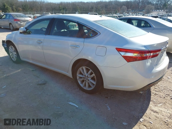 2015 Toyota Avalon Limited with VIN 4T1BK1EB9FU191692, listed as a IAAI auction lot 41519160 with 165,371 mi miles and . Bid and sale history available at DreamBid. Image 3.