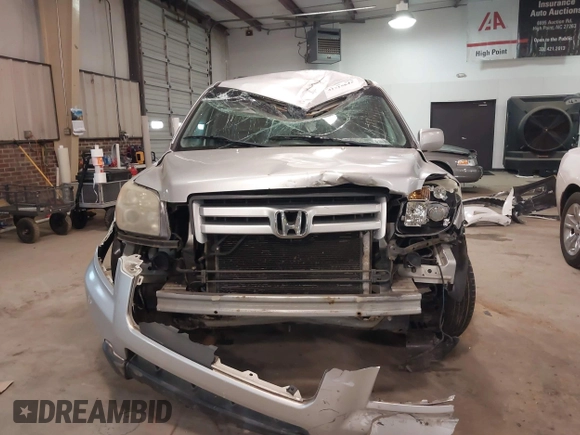 2006 Honda Pilot EX with VIN 2HKYF18416H534697, listed as a IAAI auction lot 41715642 with 224,093 mi miles and . Bid and sale history available at DreamBid. Image 11.