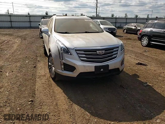 2018 Cadillac XT5 Luxury AWD with VIN 1GYKNDRS2JZ182863, listed as a Copart auction lot 64596154 with 60,951 mi miles and Salvage Title. Bid and sale history available at DreamBid. Image 11.