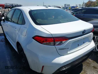 2023 Toyota Corolla Hybrid LE with VIN JTDBCMFE5P3026631, listed as a IAAI auction lot 41920841 with 105,932 mi miles. Bid and sale history available at carsss.com. Image 3.