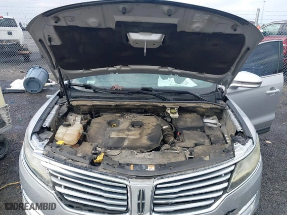2015 Lincoln MKC with VIN 5LMCJ1A95FUJ20349, listed as a IAAI auction lot 41695129 with 140,878 mi miles. Bid and sale history available at carsss.com. Image 10.