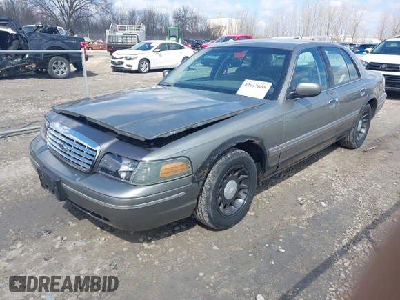 2001 Ford Crown Victoria LX z VIN 2FAFP74W01X102534, wystawiony jako IAAI lot #42017605 z przebiegiem 160 063 mil mil oraz . Historia ofert i sprzedaży dostępna na DreamBid. Obrazek 2.