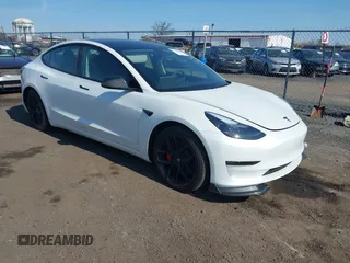 2023 Tesla Model 3 Performance z VIN 5YJ3E1EC1PF492427, wystawiony jako IAAI lot #41904825 z przebiegiem 7 721 mil mil oraz . Historia ofert i sprzedaży dostępna na DreamBid. Obrazek 1.