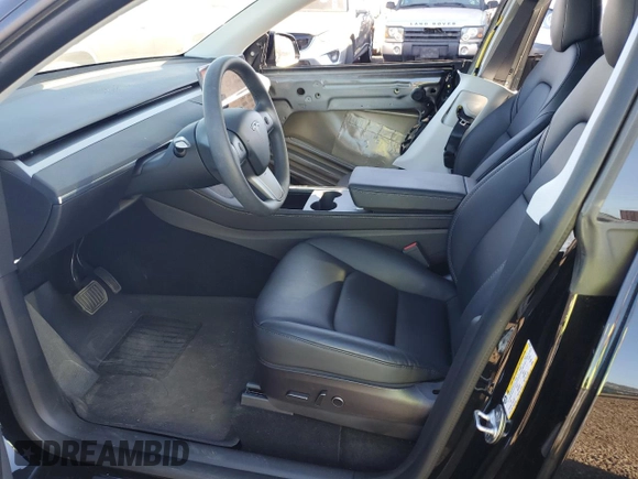 2022 Tesla Model Y Long Range z VIN 7SAYGDEE2NF391349, wystawiony jako Copart lot #85351924 z przebiegiem 5 670 mil mil oraz Szkoda całkowita • Salvage title. Historia ofert i sprzedaży dostępna na DreamBid. Obrazek 7.