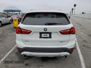 2021 BMW X1 xDrive28i with VIN WBXJG9C09M5U35093, listed as a Copart auction lot 65509155 with 46,875 mi miles and Salvage title. Bid and sale history available at DreamBid. Image 6.