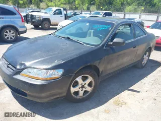 1999 Honda Accord Cpe EX with VIN 1HGCG2250XA012085, listed as a IAAI auction lot 42107661 with 266,736 mi miles. Bid and sale history available at carsss.com. Image 2.