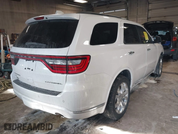 2017 Dodge Durango Citadel with VIN 1C4RDJEGXHC652853, listed as a IAAI auction lot 41631921 with 110,427 mi miles and . Bid and sale history available at carsss.com. Image 4.