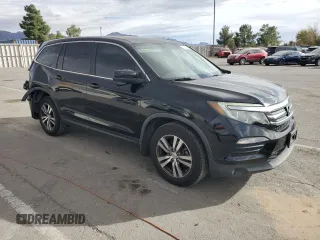 2018 Honda Pilot EX-L z VIN 5FNYF5H54JB015201, wystawiony jako Copart lot #82720584 z przebiegiem 113 273 mil mil oraz Szkoda całkowita • Salvage title. Historia ofert i sprzedaży dostępna na DreamBid. Obrazek 4.