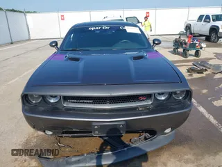 2014 Dodge Challenger R/T с VIN 2C3CDYBT8EH274089, выставлен на аукционе IAAI как лот 42392332 с пробегом 150 254 миль миль и . История ставок и продаж доступна на DreamBid. Изображение 13.