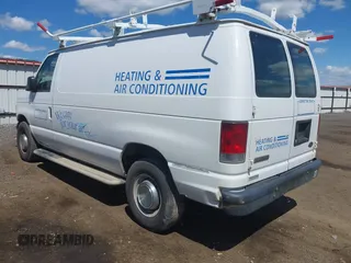 2006 Ford Econoline Cargo with VIN 1FTNE24W56HB17231, listed as a IAAI auction lot 42168028 with 256,998 mi miles and . Bid and sale history available at carsss.com. Image 3.