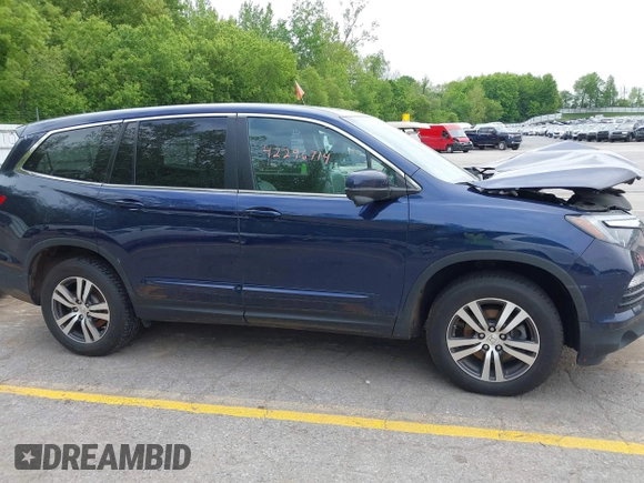 2018 Honda Pilot EX-L with VIN 5FNYF6H57JB046433, listed as a IAAI auction lot 42296714 with Not provided miles and . Bid and sale history available at DreamBid. Image 12.