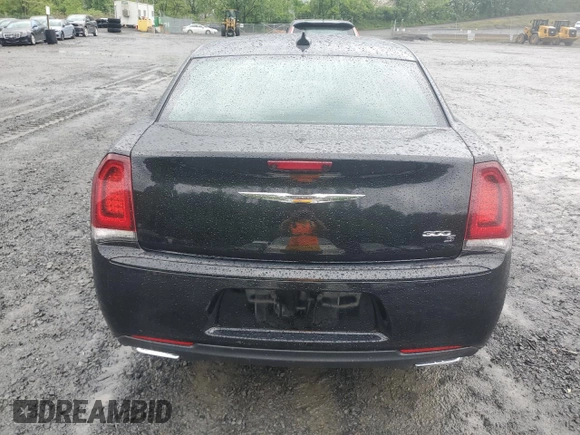 2015 Chrysler 300 S with VIN 2C3CCAGG2FH793081, listed as a Copart auction lot 56705225 with 110,450 mi miles and Salvage title. Bid and sale history available at DreamBid. Image 6.