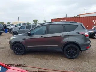 2017 Ford Escape SE with VIN 1FMCU0G99HUC65571, listed as a IAAI auction lot 41923517 with 77,179 mi miles and . Bid and sale history available at DreamBid. Image 14.