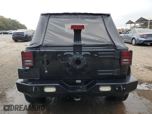 2008 Jeep Wrangler Unlimited Sahara with VIN 1J4GA59148L574934, listed as a Copart auction lot 74590164 with 134,674 mi miles and Salvage title. Bid and sale history available at DreamBid. Image 6.