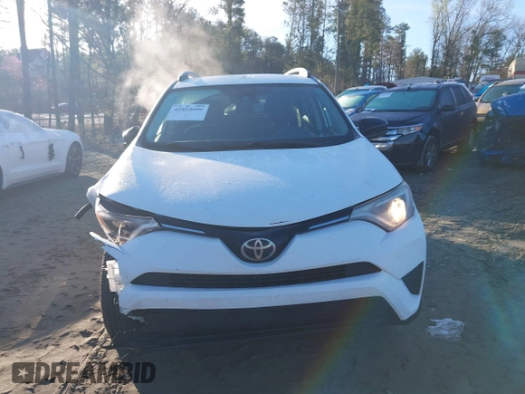 2017 Toyota RAV4 LE with VIN JTMZFREV5HJ701508, listed as a IAAI auction lot 41854606 with 175,000 mi miles and . Bid and sale history available at DreamBid. Image 12.