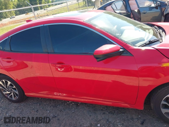 2017 Honda Civic EX z VIN 2HGFC2F77HH535613, wystawiony jako IAAI lot #42208566 z przebiegiem 121 024 mil mil oraz . Historia ofert i sprzedaży dostępna na DreamBid. Obrazek 13.