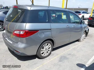 2015 Mazda Mazda5 Sport with VIN JM1CW2BL8F0185437, listed as a IAAI auction lot 41932380 with 90,029 mi miles. Bid and sale history available at carsss.com. Image 4.