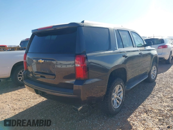 2015 Chevrolet Tahoe LS with VIN 1GNSCAKC9FR122896, listed as a IAAI auction lot 42239812 with 164,888 mi miles and . Bid and sale history available at DreamBid. Image 15.