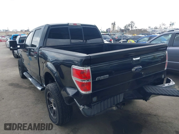 2014 Ford F-150 XL with VIN 1FTFW1CTXEKE56183, listed as a IAAI auction lot 41900304 with 94,597 mi miles and . Bid and sale history available at DreamBid. Image 3.
