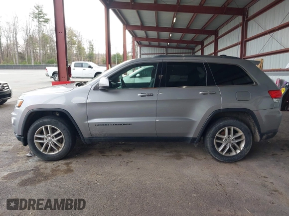 2018 Jeep Grand Cherokee Laredo E with VIN 1C4RJFAG7JC130313, listed as a IAAI auction lot 41969759 with 177,017 mi miles and . Bid and sale history available at DreamBid. Image 14.