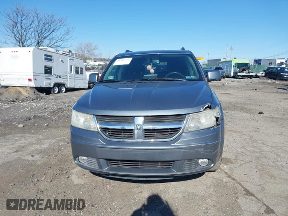 2010 Dodge Journey SXT with VIN 3D4PH5FVXAT107023, listed as a IAAI auction lot 41747572 with 165,568 mi miles and . Bid and sale history available at DreamBid. Image 11.