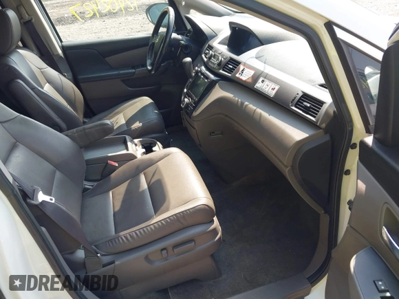 2014 Honda Odyssey EX-L with VIN 5FNRL5H63EB131596, listed as a IAAI auction lot 42402427 with 106,156 mi miles and . Bid and sale history available at DreamBid. Image 5.
