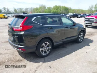 2018 Honda CR-V EX-L z VIN 7FARW2H82JE021578, wystawiony jako IAAI lot #42215280 z przebiegiem 82 571 mil mil oraz . Historia ofert i sprzedaży dostępna na DreamBid. Obrazek 4.