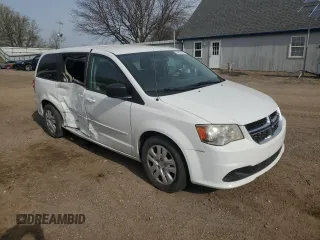 2014 Dodge Grand Caravan American Value with VIN 2C4RDGBG8ER245897, listed as a Copart auction lot 54066945 with 144,177 mi miles and Clean Title. Bid and sale history available at DreamBid. Image 4.