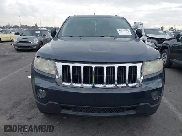 2013 Jeep Grand Cherokee Laredo with VIN 1C4RJEAGXDC620968, listed as a IAAI auction lot 41425270 with 127,739 mi miles. Bid and sale history available at carsss.com. Image 12.
